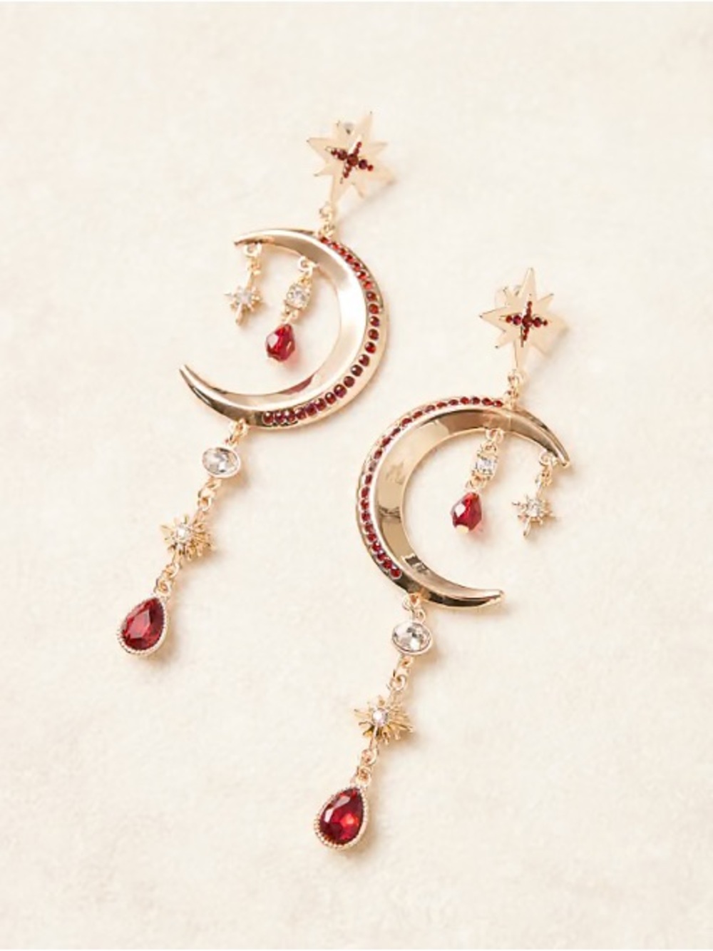 ISO ASOS DESIGN pendant earrings with detailed moon and stars in gold tone